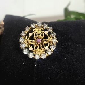Elegant Gold Tone Floral Brooch With Rhinestones